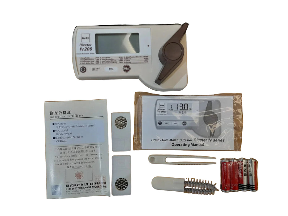moisture meter Measurement tools including a digital caliper, batteries, and a small manual on a 